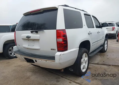 2009 Chevrolet Tahoe Ltz from USA, damaged, VIN 1GNFK33029R248011